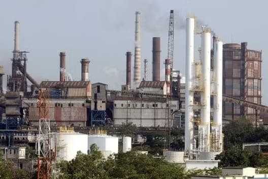 A steel plant with blast furnace stoves and stacks
