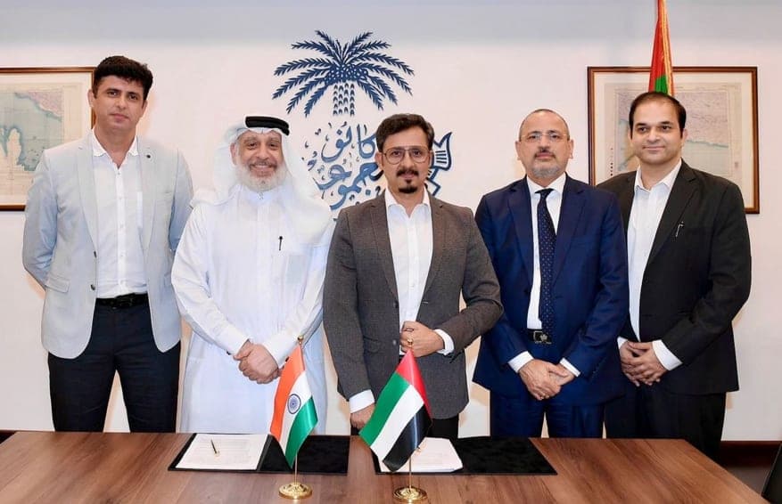 Representatives of Adage Automation and the Kanoo Group signing the AKAI and AKIC joint venture agreement